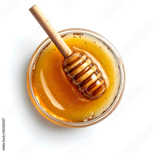 Wooden dipper stick with honey top view isolated on white background