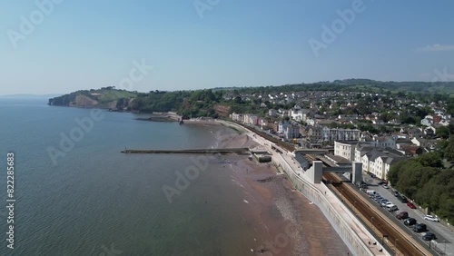 Wallpaper Mural Dawlish, South Devon, England: DRONE VIEWS: The coastline at Dawlish featuring the railway track and station, the beach, sea, houses and town quay. Dawlish is a popular UK holiday resort (Clip 5). Torontodigital.ca
