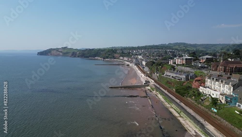 Wallpaper Mural Dawlish, South Devon, England: DRONE VIEWS: The coastline at Dawlish featuring the railway track and station, the beach, sea, houses and town quay. Dawlish is a popular UK holiday resort (Clip 3). Torontodigital.ca