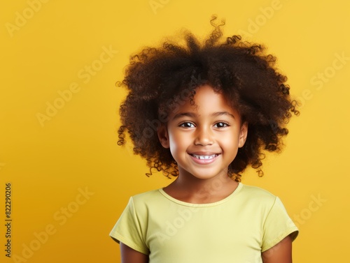 Olive background Happy black american african child Portrait of young beautiful kid Isolated on Background ethnic diversity equality acceptance 