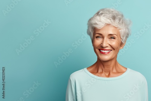 Teal background Happy european white Woman grandmother realistic person portrait of young beautiful Smiling Woman Isolated on Background Banner