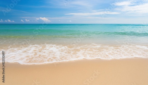 beautiful sandy beach and soft blue ocean wave