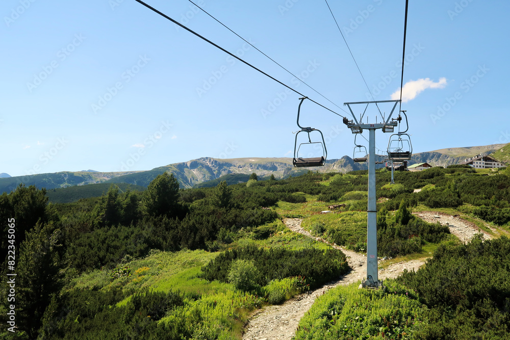 On the chairlift, lift up to the plateau of the Seven Rila Lakes in the Rila National Park, the lift station and the Rila Lakes Chalet can be seen at the top, close to Sofia, Bulgaria