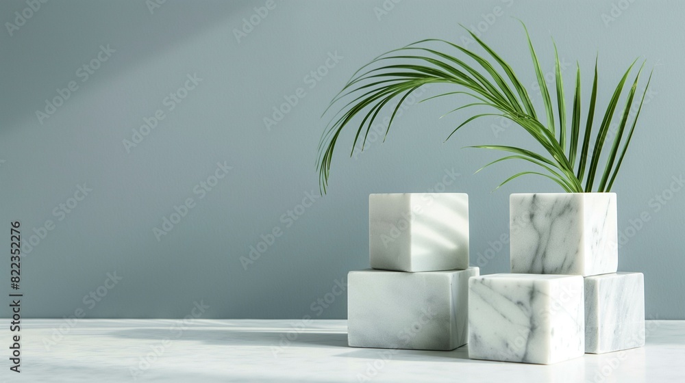 Marble Cubes with Palm Leaf on Gray Background - Minimalist Decor Marble Cubes with Palm Leaf on Gray Background - Minimalist Decor