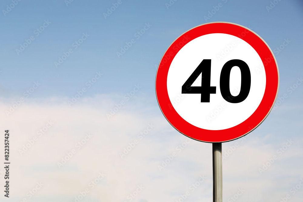 Road sign Maximum speed limit against blue sky