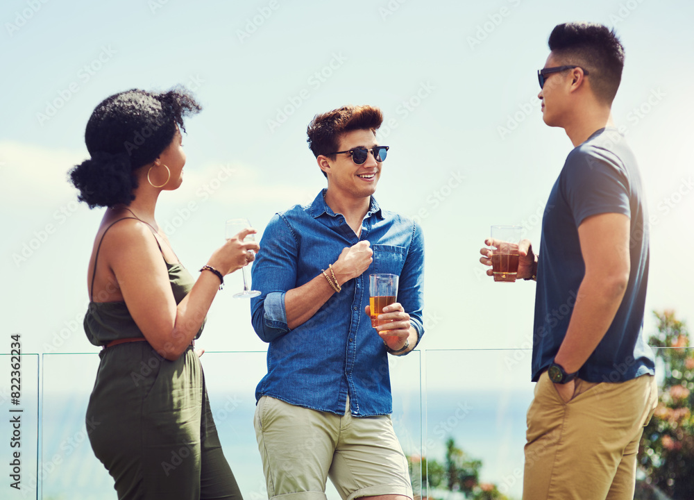 Fotografie Group, friends and talking with alcohol on rooftop for celebration, summer holiday and bonding in nature