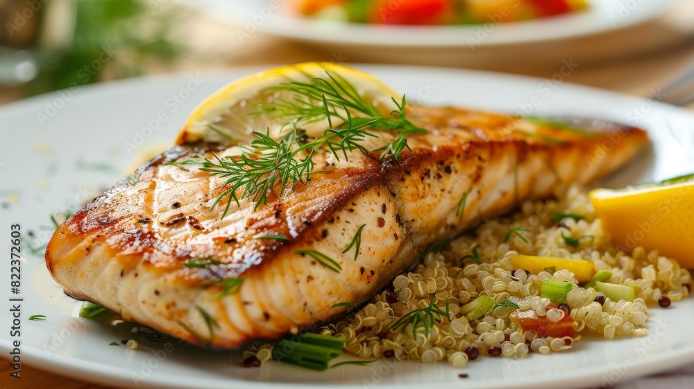Elevated image of a gourmet fish steak, garnished with dill and lemon, and served with a side of quinoa salad. Elevated image of a gourmet fish steak, garnished with dill and lemon, and served with a side of quinoa salad.