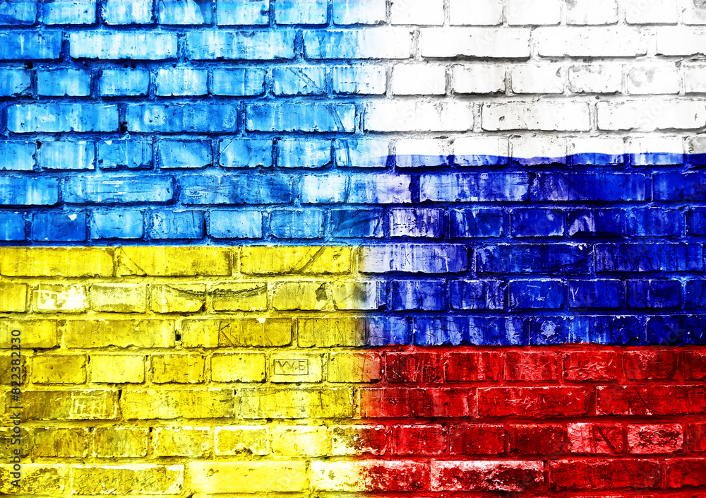 A brick wall with a flag on it A brick wall with a flag on it