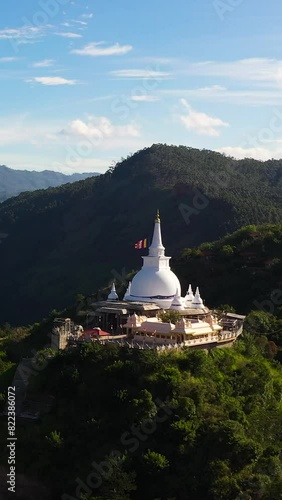 Top view of Mahamevnawa Buddhist Monastery among mountains and hills. temple in the mountain top. Bandarawela, Sri Lanka. photo