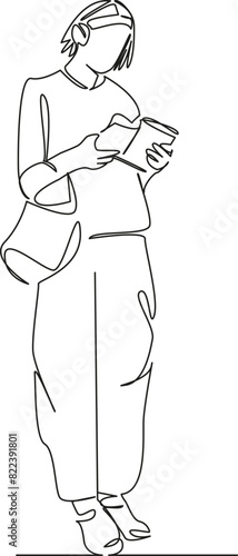 girl reading a magazine with headphones