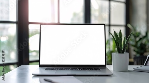 Laptop pc mock up template design on office workplace desk, white mockup empty blank computer screen on office work table business web technology at modern workspace, closeup