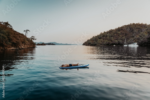 Man Resting on the Paddleboard