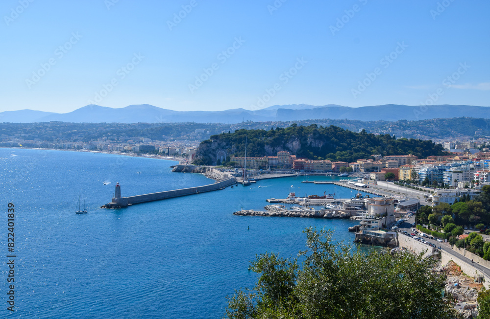 Aerial view of the sea, coast and lighthouse in Port Lympia, Nice, South of France, 2019.