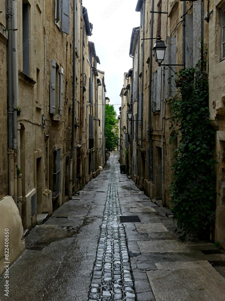 Obraz premium Montpellier May 2024: Visit the magnificent city of Montpellier in Occitanie. Street photos - View of the narrow streets