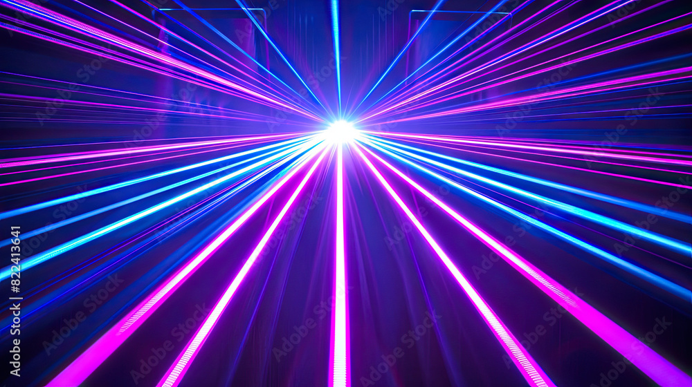 Blue and violet beams of bright laser light shining on black background Blue and violet beams of bright laser light shining on black background