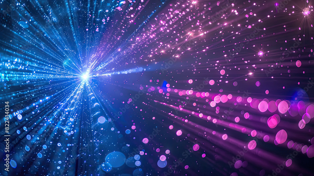 Fototapeta premium Blue and violet beams of bright laser light shining on black background