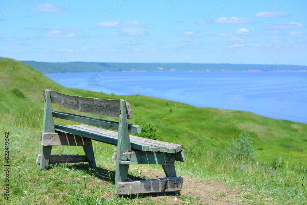 a bench with the ocean in the background copy space a bench with the ocean in the background copy space