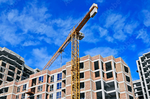 Highrise construction site and crane © Unkas Photo