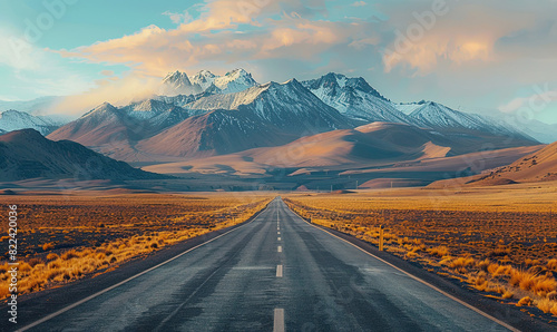 Photograph a scenic route with a straight road that stretches towards the towering Andes mountains in the background, highlighted by the soft hues of an early morning sky, , Generate AI photo