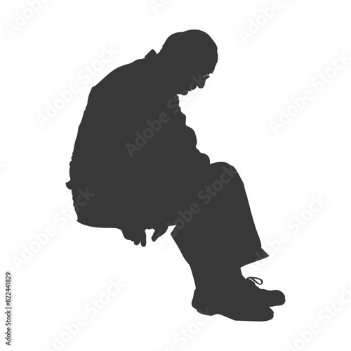 Silhouette sad elderly man sitting alone depressed sitting black color only