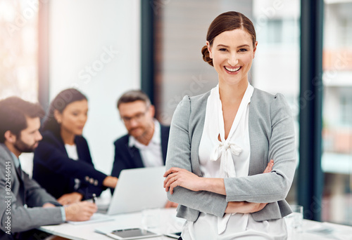 Office, conference and portrait of woman with arms crossed for investment, consultation and teamwork. Happy, financial advisor and pride in career with workshop for budget, report or business meeting