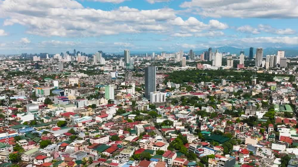 Top view of buildings, streets, and towers in Mandaluyong City. Philippines. Top view of buildings, streets, and towers in Mandaluyong City. Philippines.