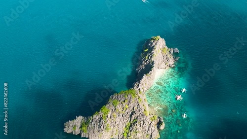 Drone view of Twin Rocks in Miniloc Island. Boats over the sea. El Nido, Philippines. Palawan. photo