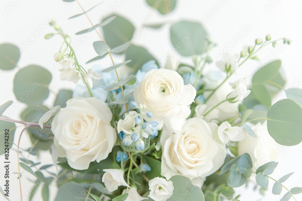 Small bouquet with white and light blue flowers on white background