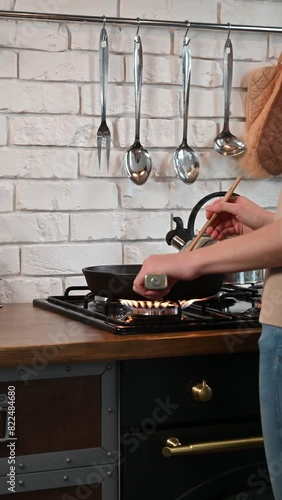 The gas is burning. Gas burns on the whip. Kitchen stove. The cooking zone is on. Dangerous gas. Gas burns in the kitchen