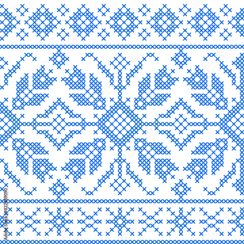 Seamless pattern in embroidery cross stitch style.
