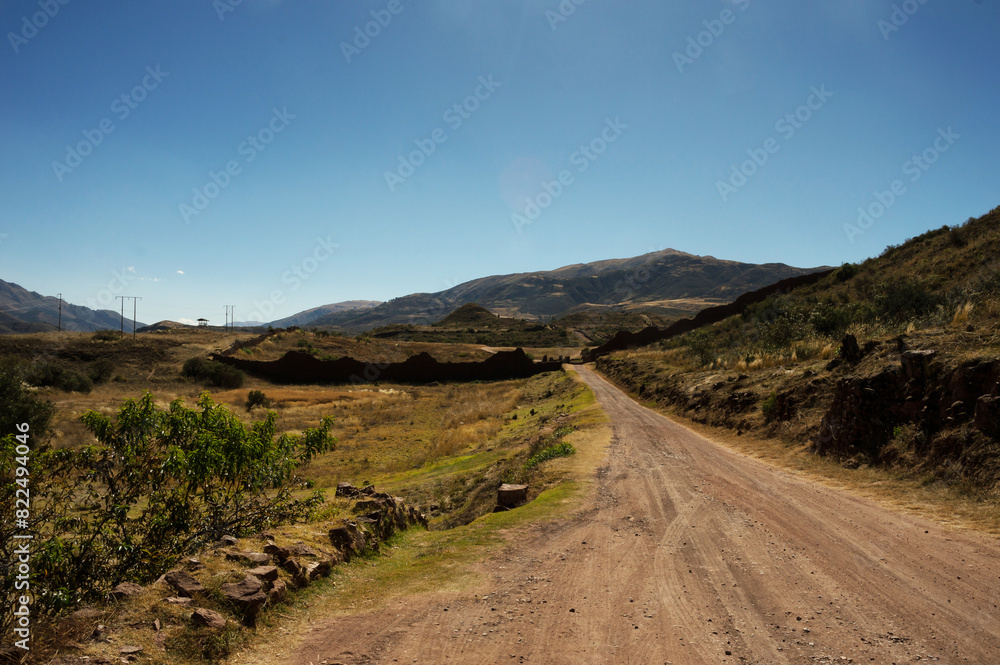 Dirt road that gives access to the Pikillacta archaeological site in Cusco, Peru Dirt road that gives access to the Pikillacta archaeological site in Cusco, Peru