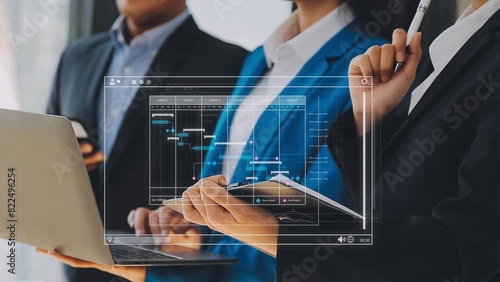 Project manager working with Gantt chart schedule to plan tasks and deliverables. Scheduling activities with a planning software, Corporate strategy for finance, operations, sales, marketing. photo