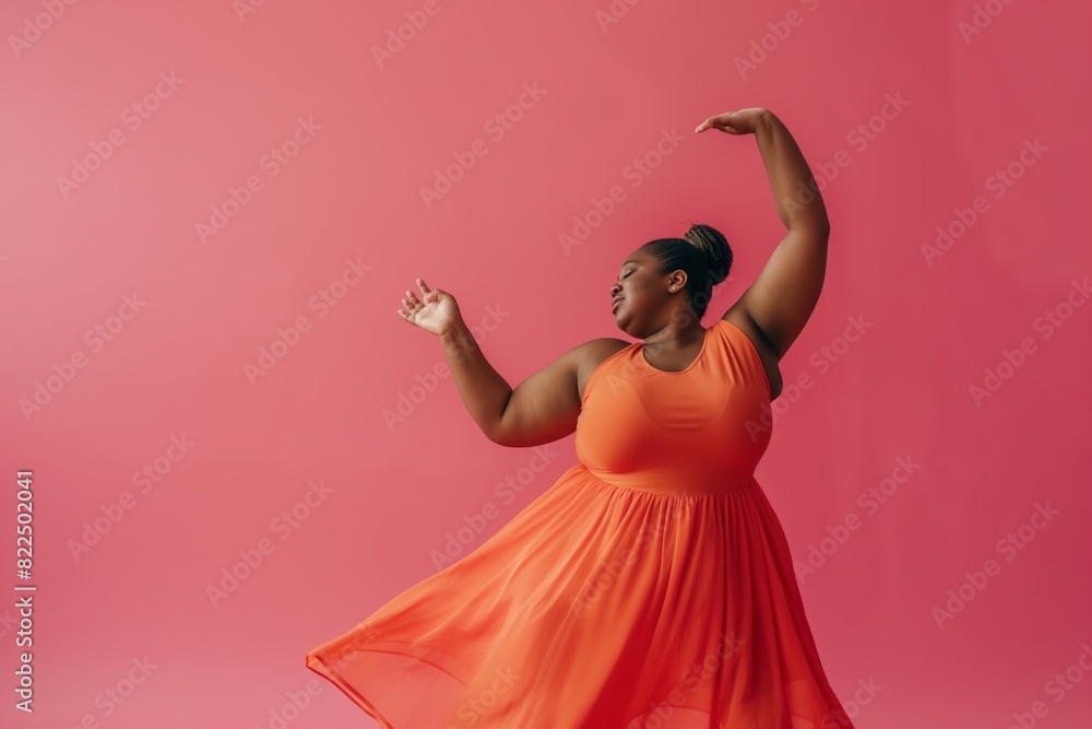 Fototapeta premium Black african american overweight young woman closed eyes dancing on solid pink background