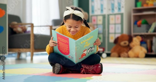 Konstfotografi Girl, school and reading book in classroom, childhood development and growth for vocabulary in kindergarten