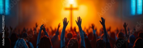 A group of people are worshipping in a church with their hands raised in the air. AI.