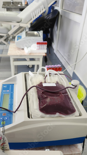 a package of donated human blood without labels on special equipment for receiving blood. Blood donation and blood transfusion