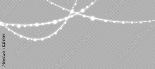 Christmas glowing garland. Christmas lights isolated on transparent background. Sparks sparkle with a special light effect.Vector 10 EPS
