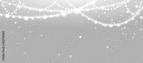 Christmas glowing garland. Christmas lights isolated on transparent background. Sparks sparkle with a special light effect.Vector 10 EPS