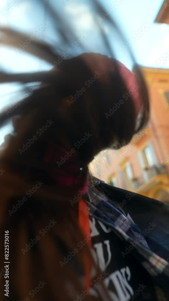 A pretty girl enjoys a leisurely walk through Italian alleyways. A pretty girl enjoys a leisurely walk through Italian alleyways.