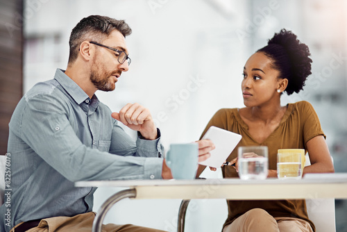 Meeting, woman and man with tablet in office for connection, communication and social media. Businesspeople, coworkers and technology in company for information, internet or online as project manager photo