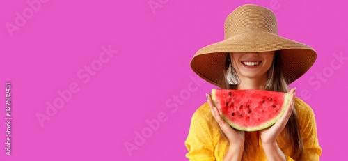 Happy young woman holding s...