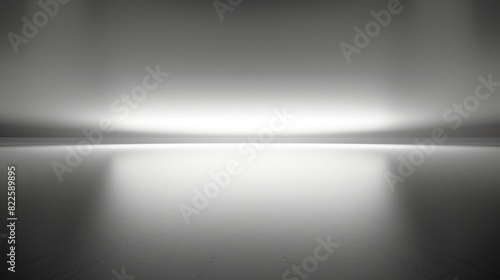  A black-and-white photo of a room with one light at each end
