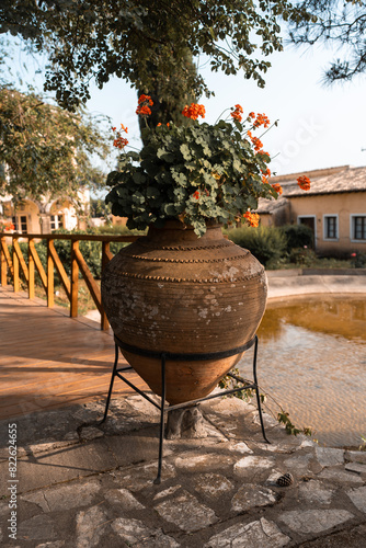 old vase amphora street at the Danilia village Corfu island Greece photo