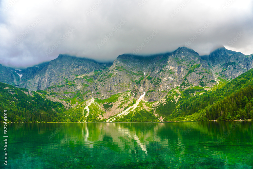 Fototapeta premium Tatra National Park in Poland. Mountains lake Morskie oko or Sea Eye lake In High Tatras. Five lakes valley