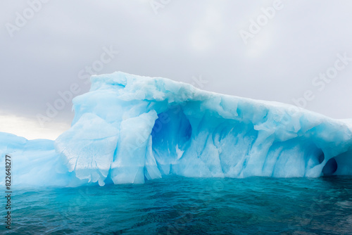 Brown Bluff, Antarctica. An iceberg juts out of the sea in the Antarctic Sound. photo
