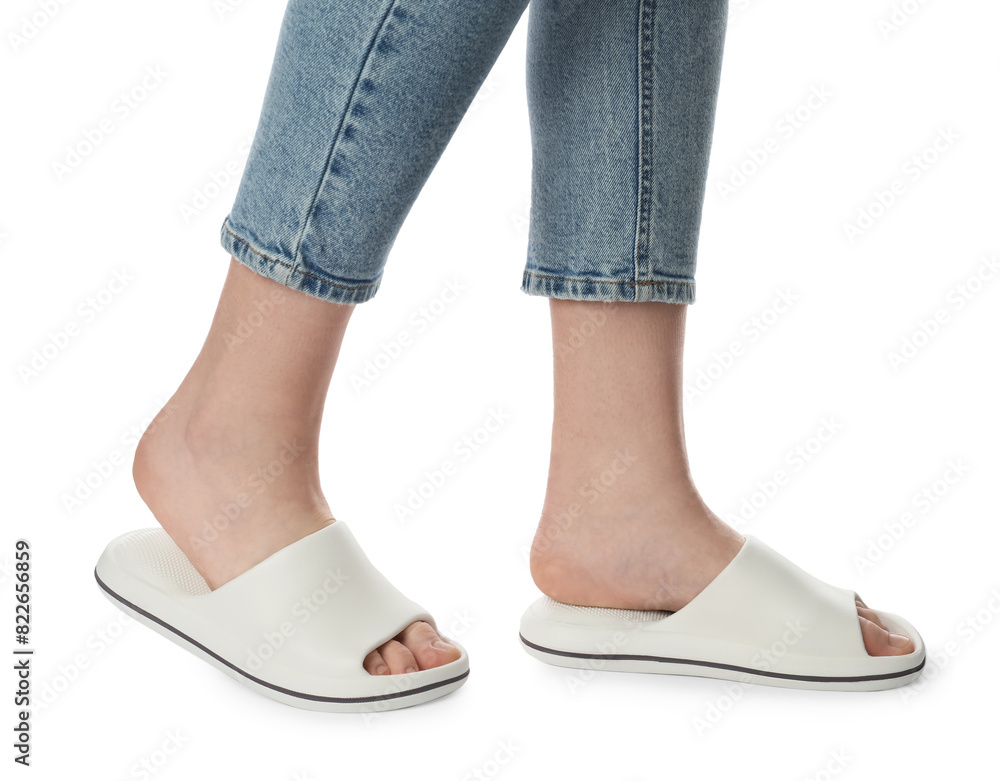 Woman in slippers on white background, closeup Woman in slippers on white background, closeup