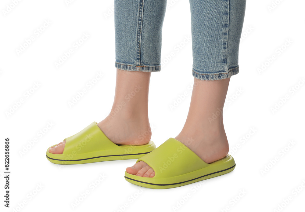 Woman in green slippers on white background, closeup Woman in green slippers on white background, closeup
