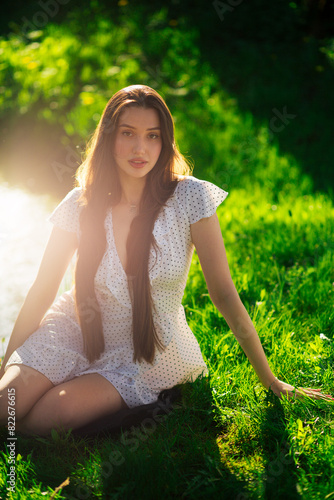 Long-haired brunette in nature portraits