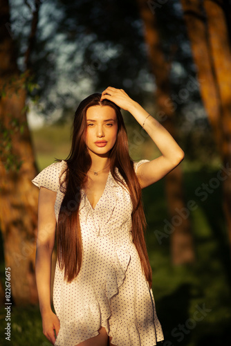 Long-haired brunette in nature portraits