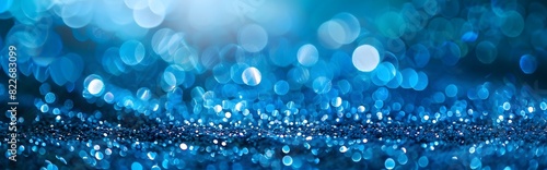 Abstract Background with Blue Bokeh Lights and Glitter